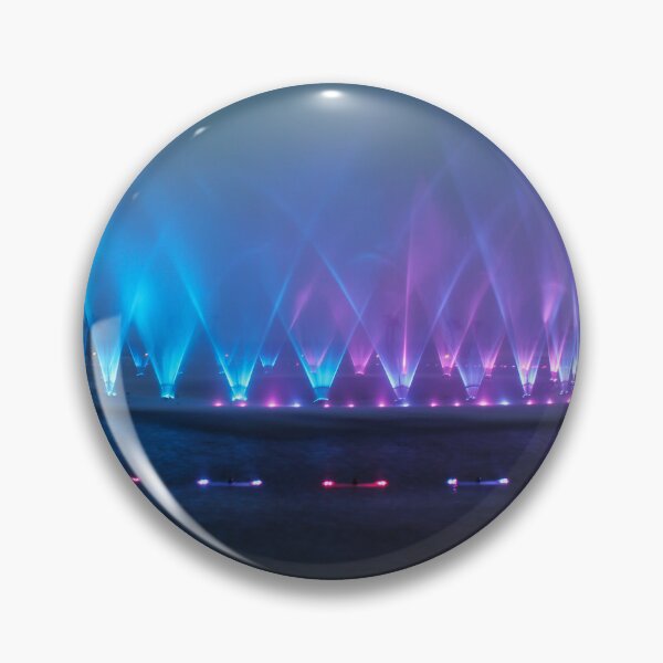 Item preview, Colorful Illuminated Fountain Show At Dusk With Water Jets Over Waterfront designed and sold by Nmallia.