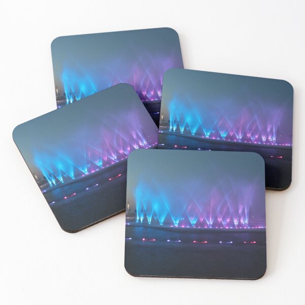Item preview, Colorful Illuminated Fountain Show At Dusk With Water Jets Over Waterfront designed and sold by Nmallia.