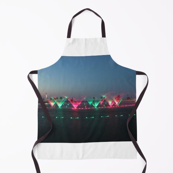 Item preview, Colorful Illuminated Fountain Show At Dusk With Water Jets Over Waterfront designed and sold by Nmallia.