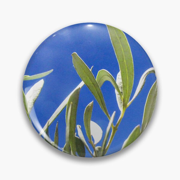 Item preview, Olive Tree Leaves Backlit Against Deep Blue Sky on a Sunny Mediterranean Day designed and sold by Nmallia.