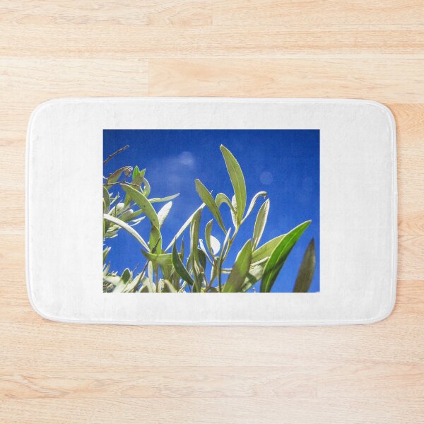Item preview, Olive Tree Leaves Backlit Against Deep Blue Sky on a Sunny Mediterranean Day designed and sold by Nmallia.