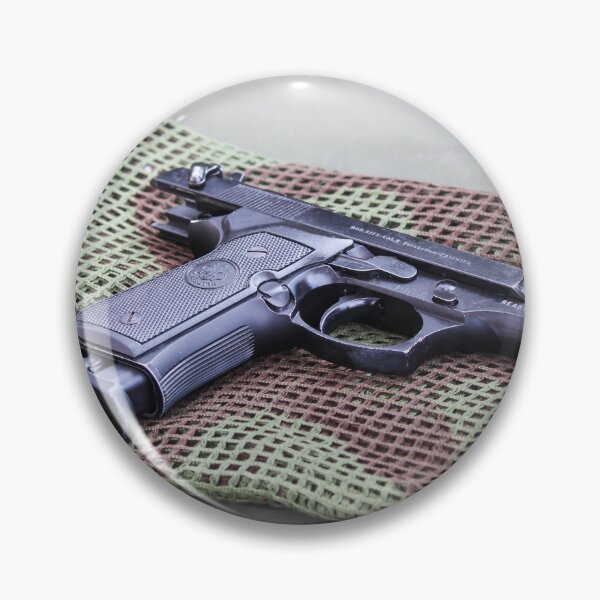 Item preview, Black Pistol Handgun Laid on Camouflage Mesh Cloth Ready for Inspection or Display on Table designed and sold by Nmallia.