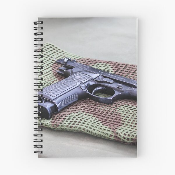 Item preview, Black Pistol Handgun Laid on Camouflage Mesh Cloth Ready for Inspection or Display on Table designed and sold by Nmallia.