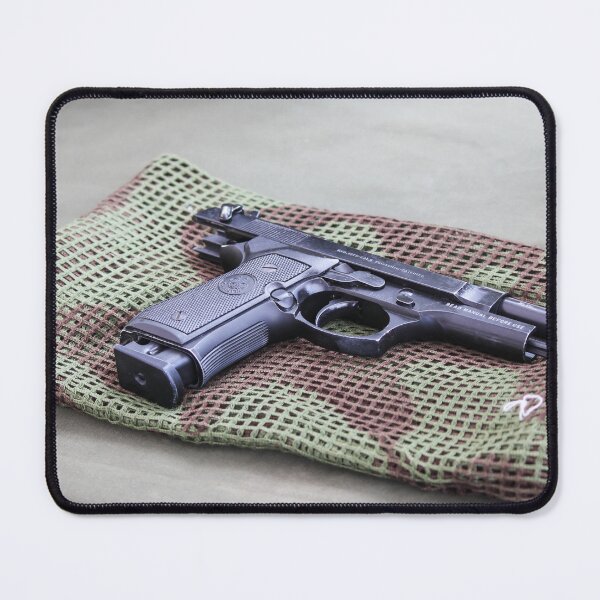 Item preview, Black Pistol Handgun Laid on Camouflage Mesh Cloth Ready for Inspection or Display on Table designed and sold by Nmallia.