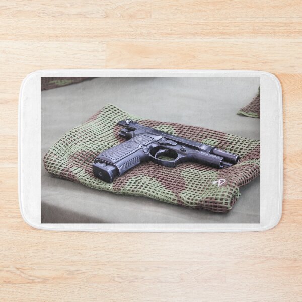 Item preview, Black Pistol Handgun Laid on Camouflage Mesh Cloth Ready for Inspection or Display on Table designed and sold by Nmallia.