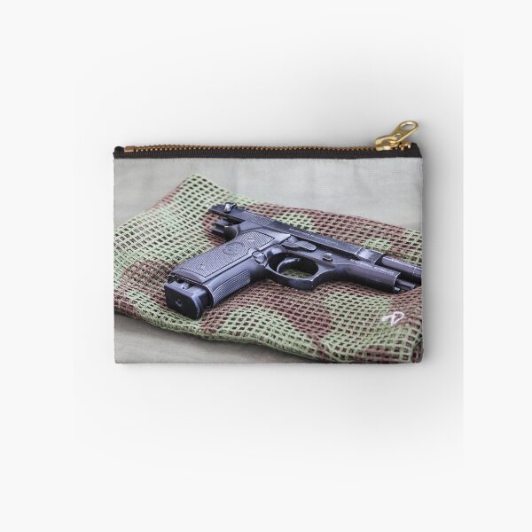 Item preview, Black Pistol Handgun Laid on Camouflage Mesh Cloth Ready for Inspection or Display on Table designed and sold by Nmallia.