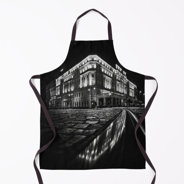 Item preview, Black and white night view of the Radisson Blu Carlton Hotel in Bratislava, Slovakia, with illuminated historic facade, cobblestone street and tram tracks creating a dramatic urban composition. designed and sold by RastislavS.