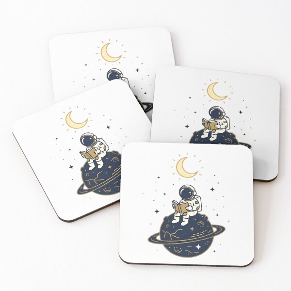 Item preview, Astronaut Reading Book on Saturn Planet designed and sold by DREZKO.