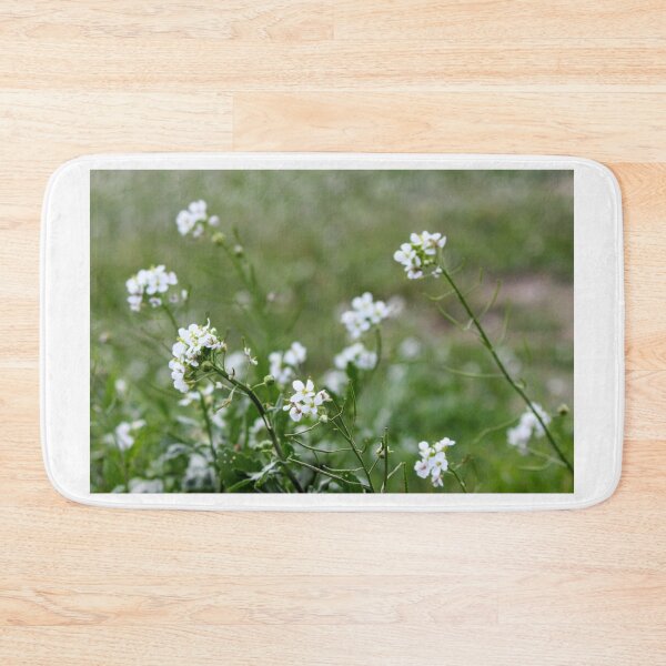 Item preview, White Wildflowers Close-Up In Green Field On Spring Meadow With Soft Focus Background designed and sold by Nmallia.