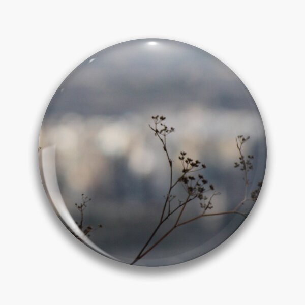 Item preview, Silhouetted Wildflower Stems in Foreground With Blurred Coastal Cityscape and Sea Background designed and sold by Nmallia.