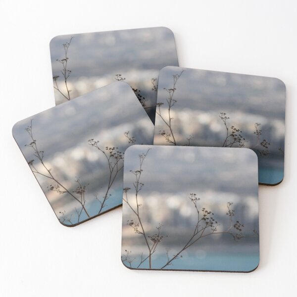 Item preview, Silhouetted Wildflower Stems in Foreground With Blurred Coastal Cityscape and Sea Background designed and sold by Nmallia.