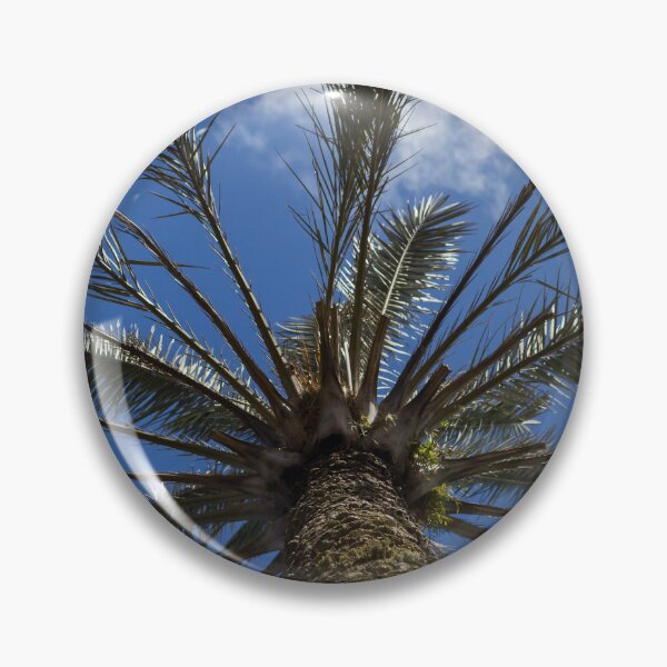 Item preview, Looking Up at a Tall Palm Tree Against a Bright Blue Sky With Wispy Clouds designed and sold by Nmallia.