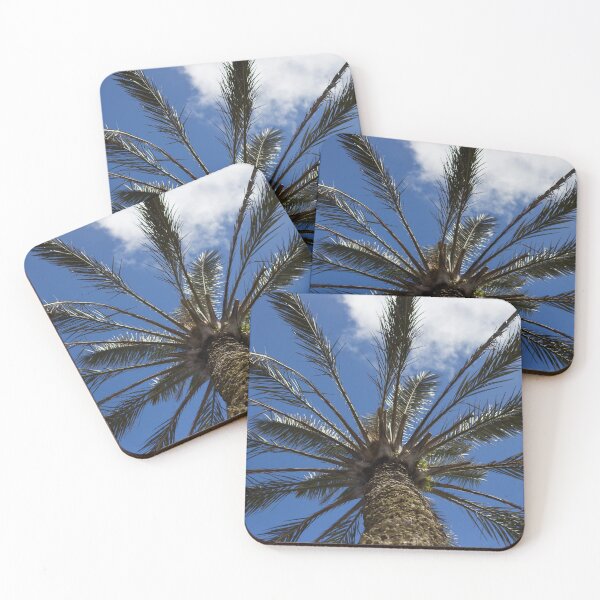 Item preview, Looking Up at a Tall Palm Tree Against a Bright Blue Sky With Wispy Clouds designed and sold by Nmallia.