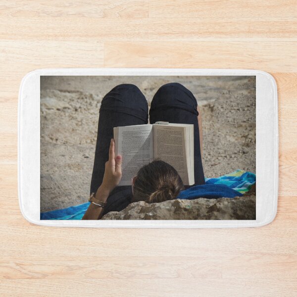 Item preview, Woman Reading a Book While Relaxing on a Rocky Beach Towel in Sunlight and Leisure designed and sold by Nmallia.