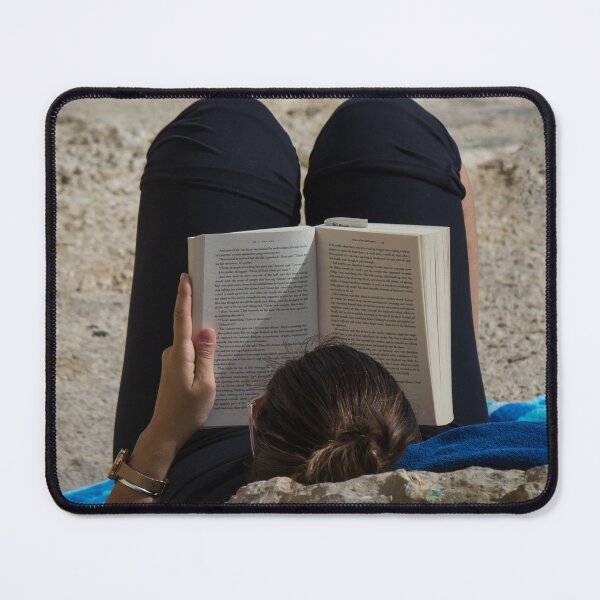 Item preview, Woman Reading a Book While Relaxing on a Rocky Beach Towel in Sunlight and Leisure designed and sold by Nmallia.