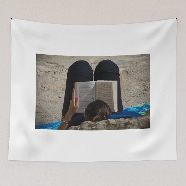 Item preview, Woman Reading a Book While Relaxing on a Rocky Beach Towel in Sunlight and Leisure designed and sold by Nmallia.