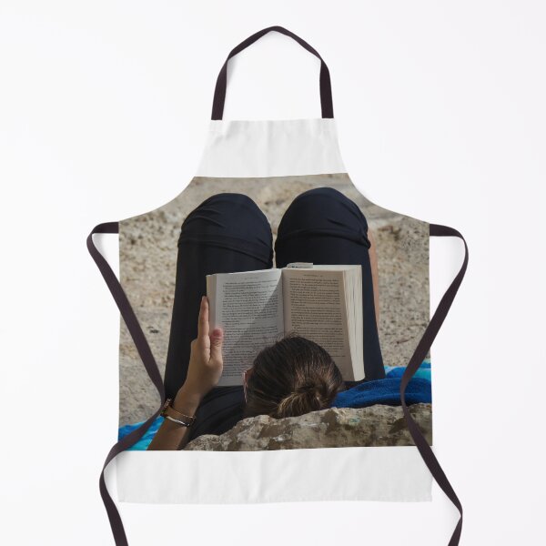 Item preview, Woman Reading a Book While Relaxing on a Rocky Beach Towel in Sunlight and Leisure designed and sold by Nmallia.