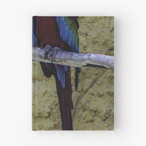 Item preview, Colorful Scarlet Macaw Perched on Branch Against Textured Yellow Background, Tropical Bird Portrait designed and sold by Nmallia.