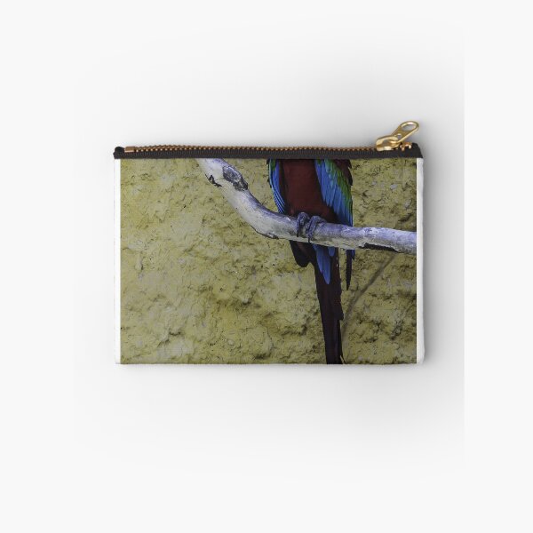 Item preview, Colorful Scarlet Macaw Perched on Branch Against Textured Yellow Background, Tropical Bird Portrait designed and sold by Nmallia.