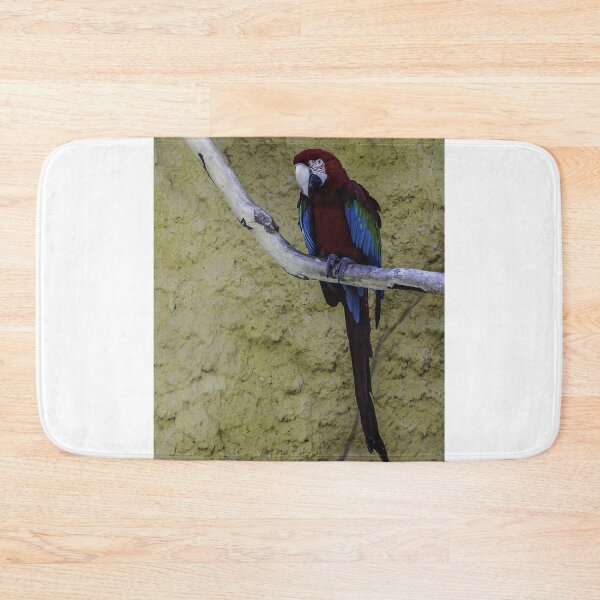 Item preview, Colorful Scarlet Macaw Perched on Branch Against Textured Yellow Background, Tropical Bird Portrait designed and sold by Nmallia.