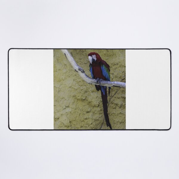 Item preview, Colorful Scarlet Macaw Perched on Branch Against Textured Yellow Background, Tropical Bird Portrait designed and sold by Nmallia.