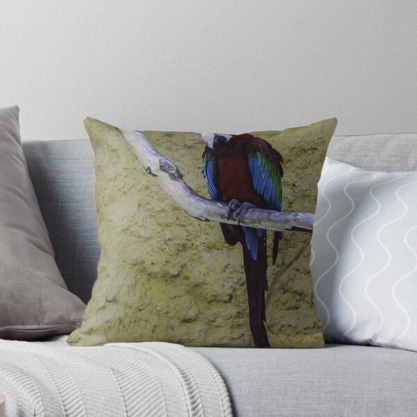 Item preview, Colorful Scarlet Macaw Perched on Branch Against Textured Yellow Background, Tropical Bird Portrait designed and sold by Nmallia.