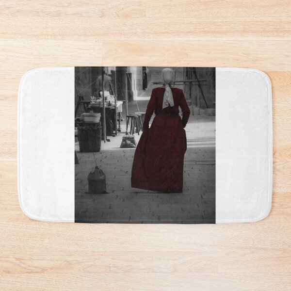 Item preview, Woman in Red Dress and Headscarf Walking Through Historic Narrow Street, Back View, Selective Color designed and sold by Nmallia.