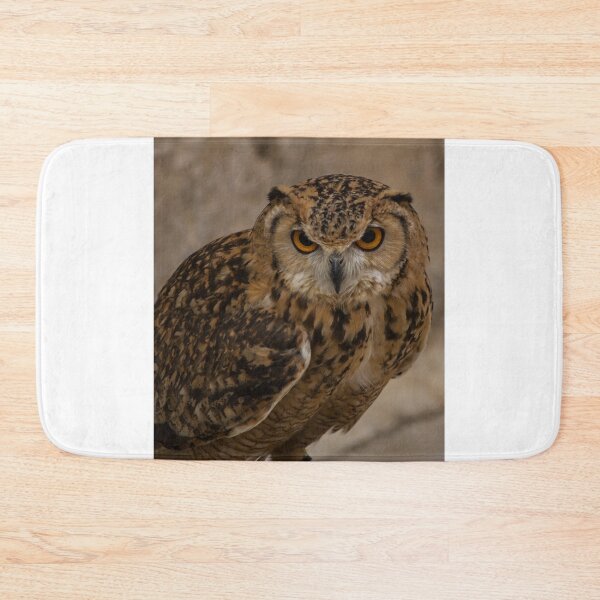 Item preview, Close-Up Portrait of a Eurasian Eagle-Owl With Intense Orange Eyes Perched and Alert designed and sold by Nmallia.