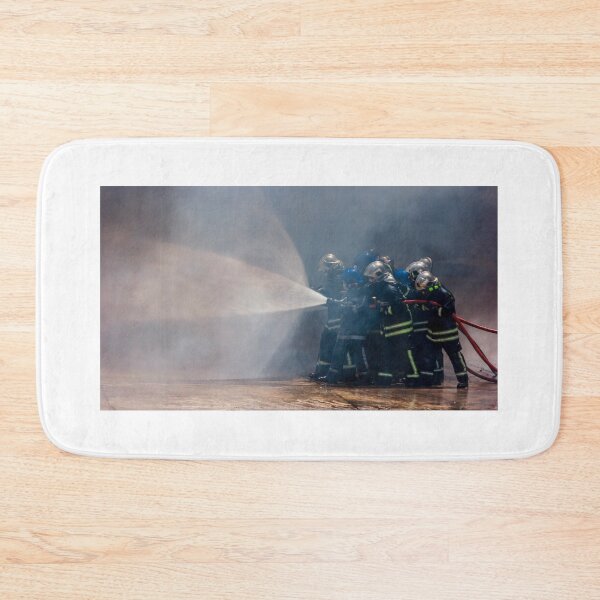 Item preview, Firefighters Team Battling Heavy Smoke and Flames With Hose During Emergency Fire Response Training and Rescue Operation designed and sold by Nmallia.