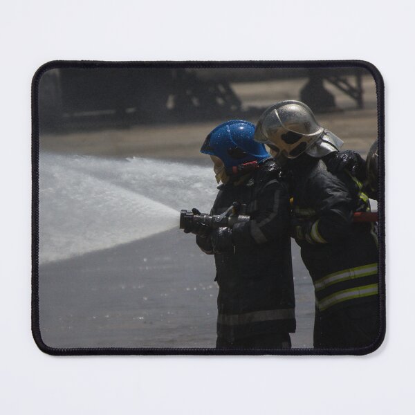 Item preview, Firefighters Team Battling Heavy Smoke and Flames With Hose During Emergency Fire Response Training and Rescue Operation designed and sold by Nmallia.