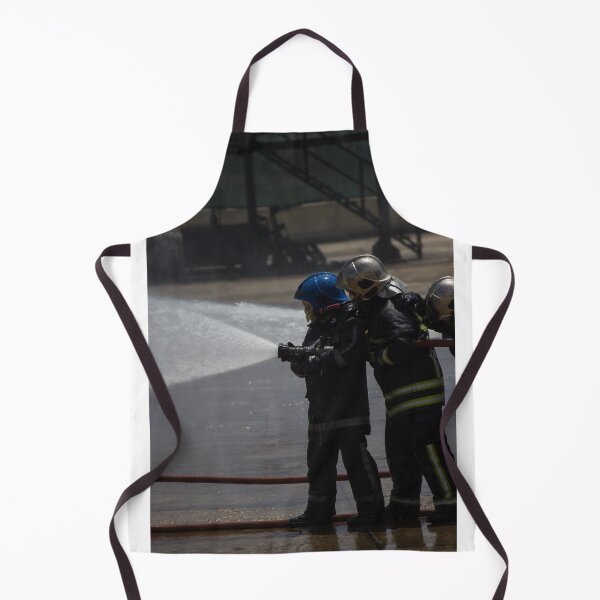 Item preview, Firefighters Team Battling Heavy Smoke and Flames With Hose During Emergency Fire Response Training and Rescue Operation designed and sold by Nmallia.