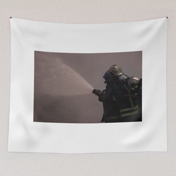Item preview, Firefighters Team Battling Heavy Smoke and Flames With Hose During Emergency Fire Response Training and Rescue Operation designed and sold by Nmallia.
