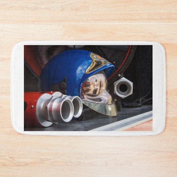Item preview, Firefighter Helmet With Reflective Visor and Hose Fittings On Fire Truck Equipment Shelf designed and sold by Nmallia.