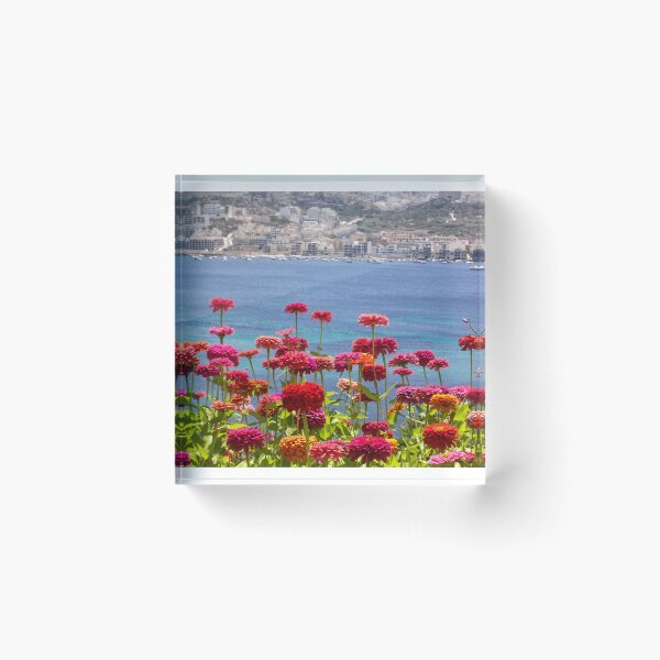Item preview, Colorful Zinnias in Bloom Overlooking Turquoise Sea and Charming Coastal Town on a Sunny Day designed and sold by Nmallia.