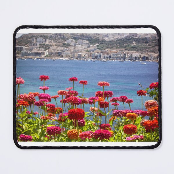 Item preview, Colorful Zinnias in Bloom Overlooking Turquoise Sea and Charming Coastal Town on a Sunny Day designed and sold by Nmallia.