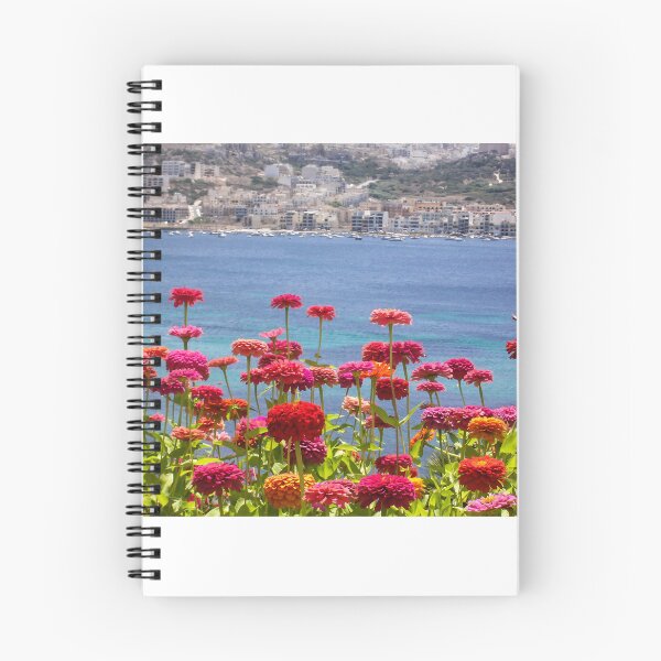 Item preview, Colorful Zinnias in Bloom Overlooking Turquoise Sea and Charming Coastal Town on a Sunny Day designed and sold by Nmallia.