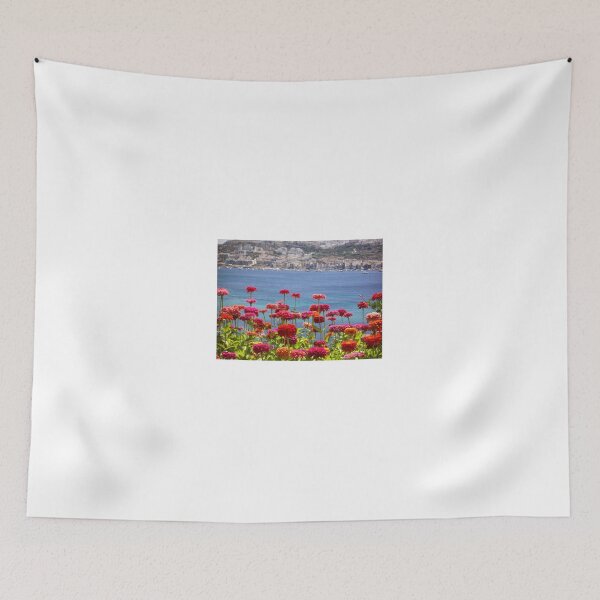 Item preview, Colorful Zinnias in Bloom Overlooking Turquoise Sea and Charming Coastal Town on a Sunny Day designed and sold by Nmallia.