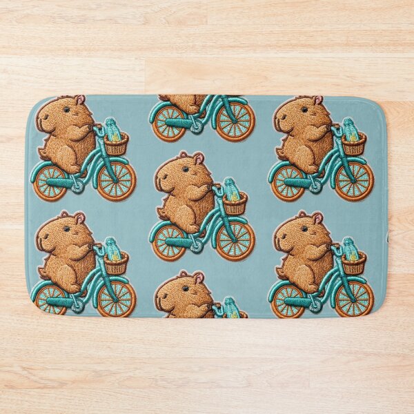 Item preview, Cute Embroidered Capybara Riding Bicycle Patch designed and sold by MegaNovaArt.