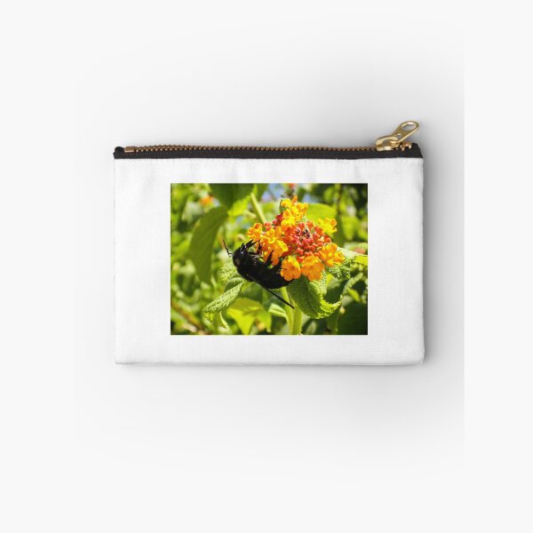 Item preview, Black Bee On Orange Lantana Flower Closeup In Sunny Garden Pollinating Nectar designed and sold by Nmallia.