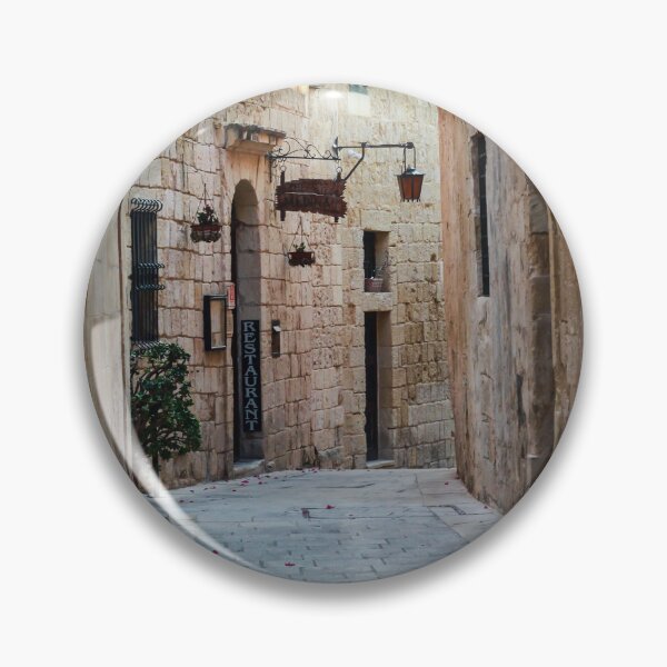 Item preview, Sunlit Narrow Stone Alley With Lanterns and Restaurant Sign in Historic Old Town designed and sold by Nmallia.