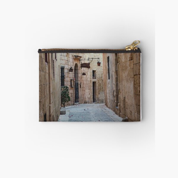Item preview, Sunlit Narrow Stone Alley With Lanterns and Restaurant Sign in Historic Old Town designed and sold by Nmallia.