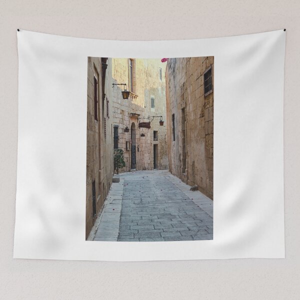 Item preview, Sunlit Narrow Stone Alley With Lanterns and Restaurant Sign in Historic Old Town designed and sold by Nmallia.