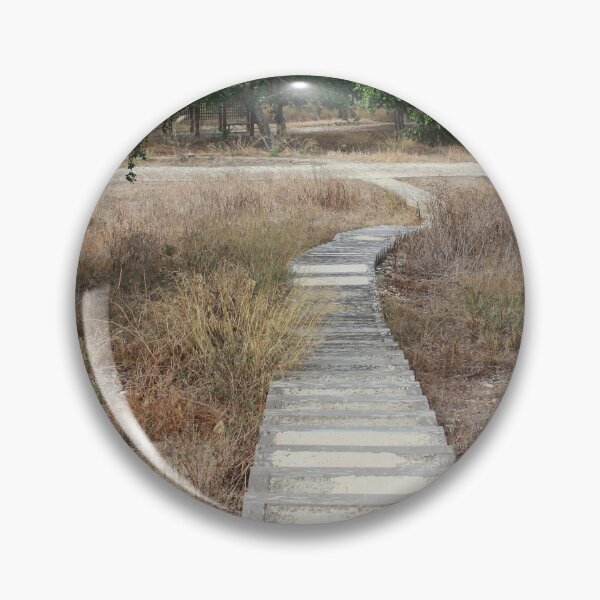 Item preview, Curving Boardwalk Path Through Dry Meadow Leading Into Green Trees And Historic Stone Walls designed and sold by Nmallia.