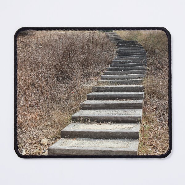 Item preview, Curving Boardwalk Path Through Dry Meadow Leading Into Green Trees And Historic Stone Walls designed and sold by Nmallia.