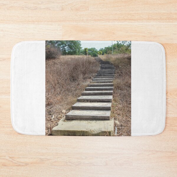 Item preview, Curving Boardwalk Path Through Dry Meadow Leading Into Green Trees And Historic Stone Walls designed and sold by Nmallia.