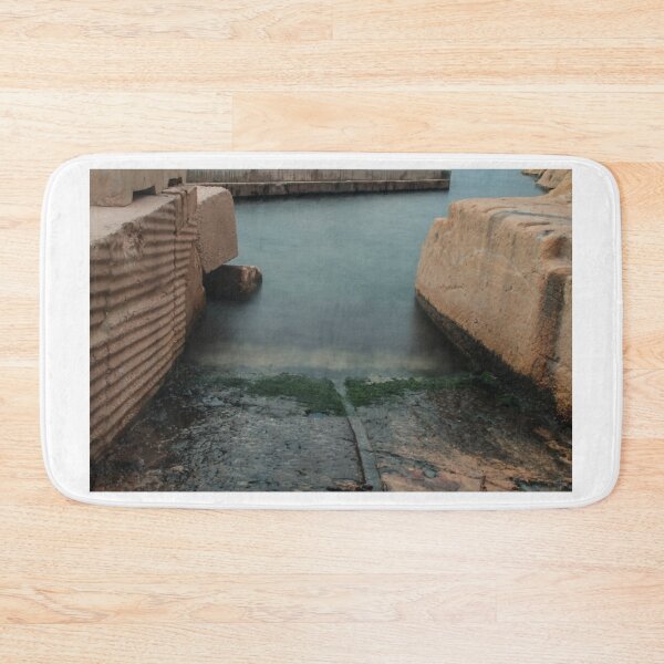 Item preview, Moody Coastal Harbor Slipway Between Concrete Rocks With Smooth Sea Water and Algae designed and sold by Nmallia.