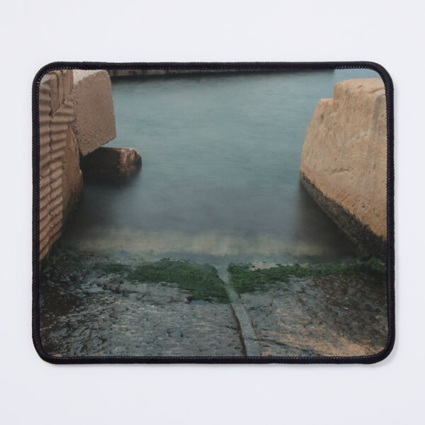 Item preview, Moody Coastal Harbor Slipway Between Concrete Rocks With Smooth Sea Water and Algae designed and sold by Nmallia.