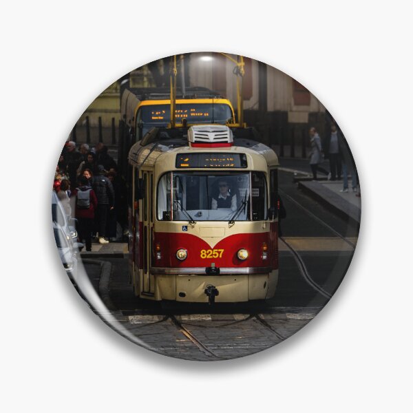 Item preview, Red Prague tram on a busy historic street, Czech Republic designed and sold by AndreiWBU.