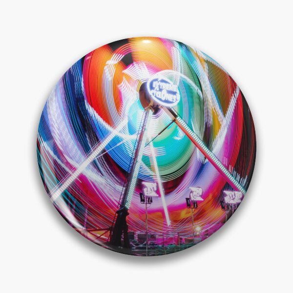 Item preview, Abstract rainbow light trails of a spinning carnival ride at night designed and sold by AndreiWBU.