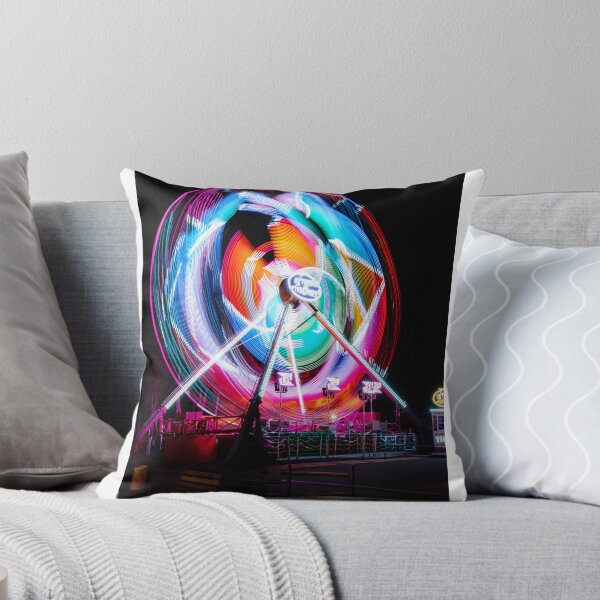 Item preview, Abstract rainbow light trails of a spinning carnival ride at night designed and sold by AndreiWBU.
